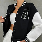 Black and white varsity jacket with a large 'A' on a neutral background